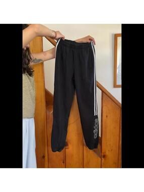 Adidas black joggers with white stripes